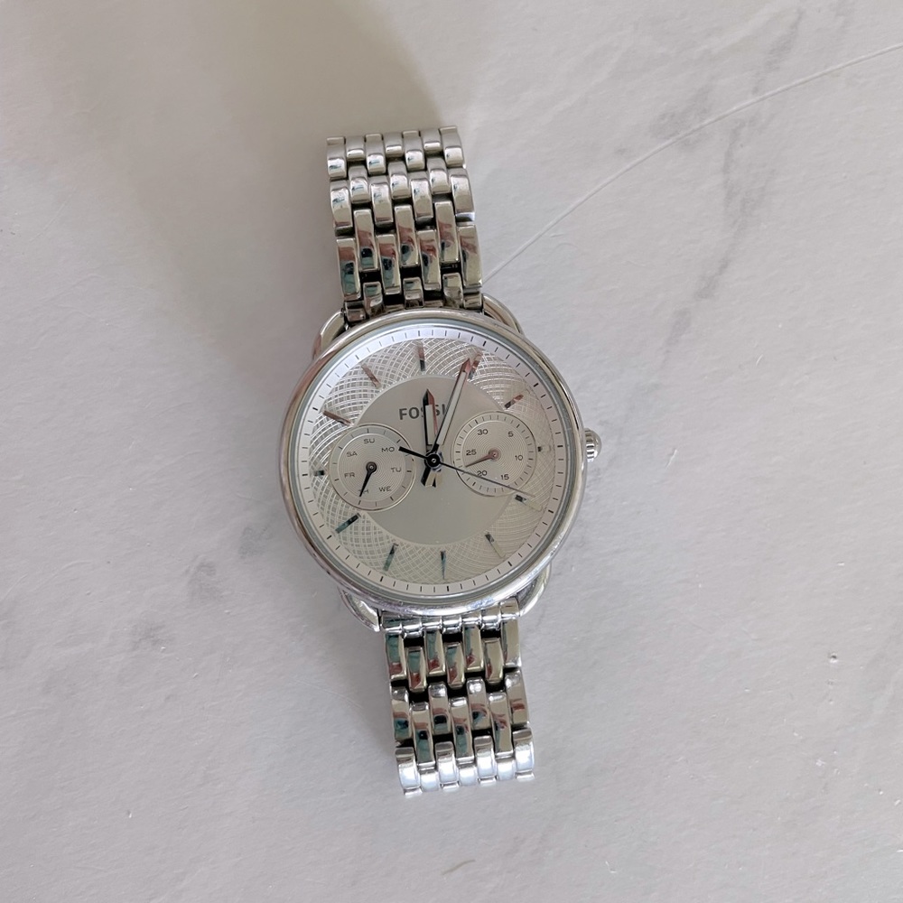 Women’s silver Fossil watch